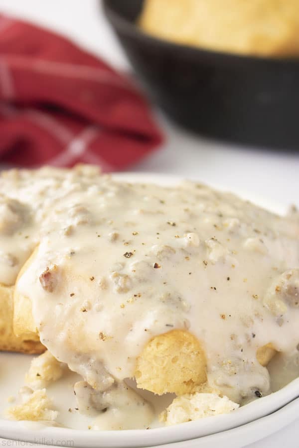 Sausage gravy and biscuits on a plate