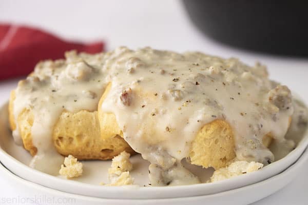Sausage gravy on top of biscuits