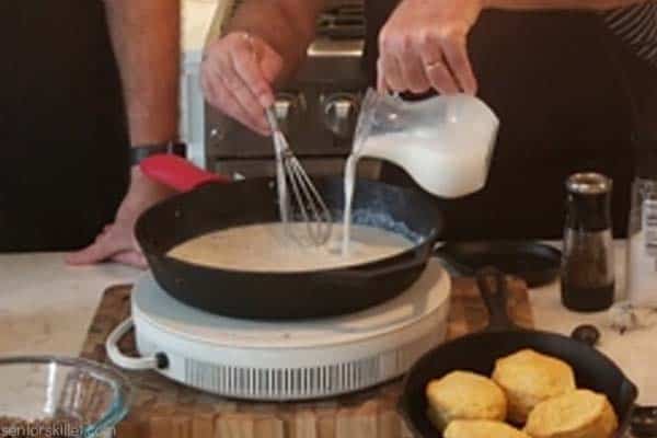 Milk being added to pan