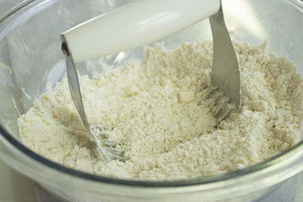 Pastry blender working the butter and flour