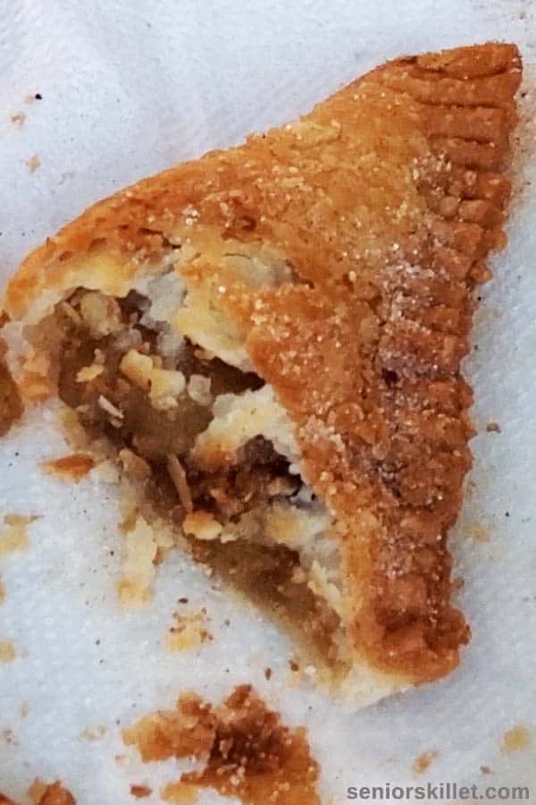 Failed ugly fried apple pie on a paper towel