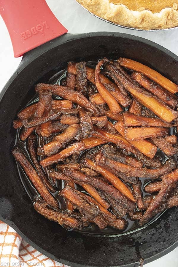Pumpkin Spice carrots in a cast iron skillet