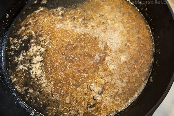 Brown sugar and melted butter in cast iron skillet