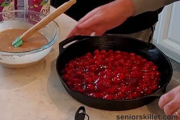 Cherries in bottom of cast iron skillet