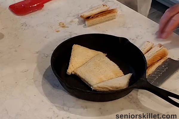 Adding bread to pan