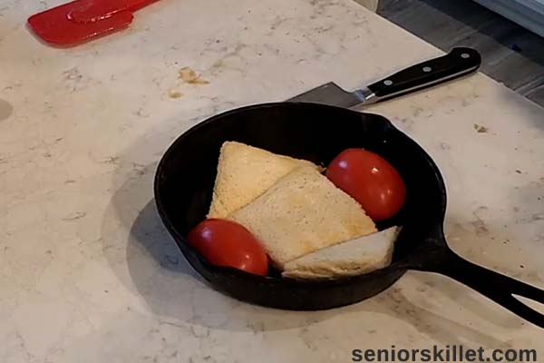 Tomatoes added to pan