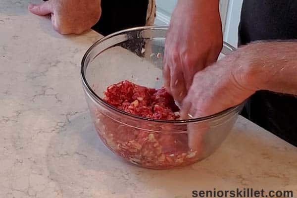 Mixing the meatloaf mixture