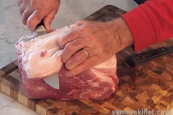 Trimming fat from pork