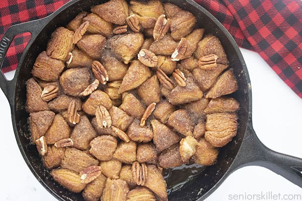 Pecans on the top of skillet sticky bread