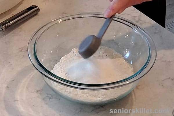 Batter dry ingredients added to bowl
