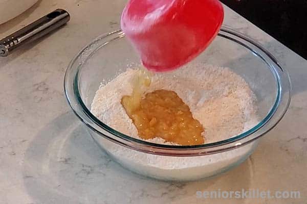 Creamed corn added to hush puppy dry ingredients