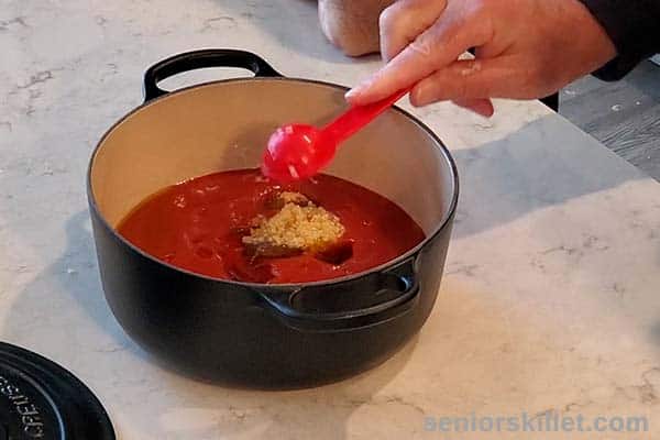 Adding garlic and onion to sauce