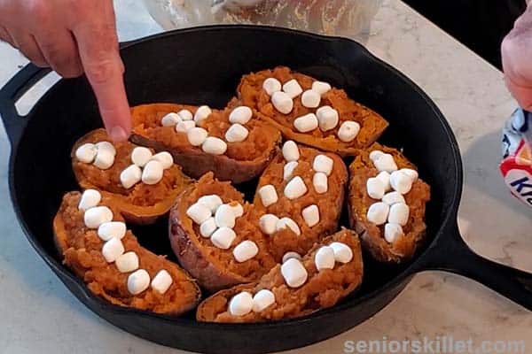 Marshmallows on top of sweet potatoes