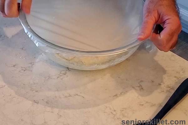 Covering dough to rise