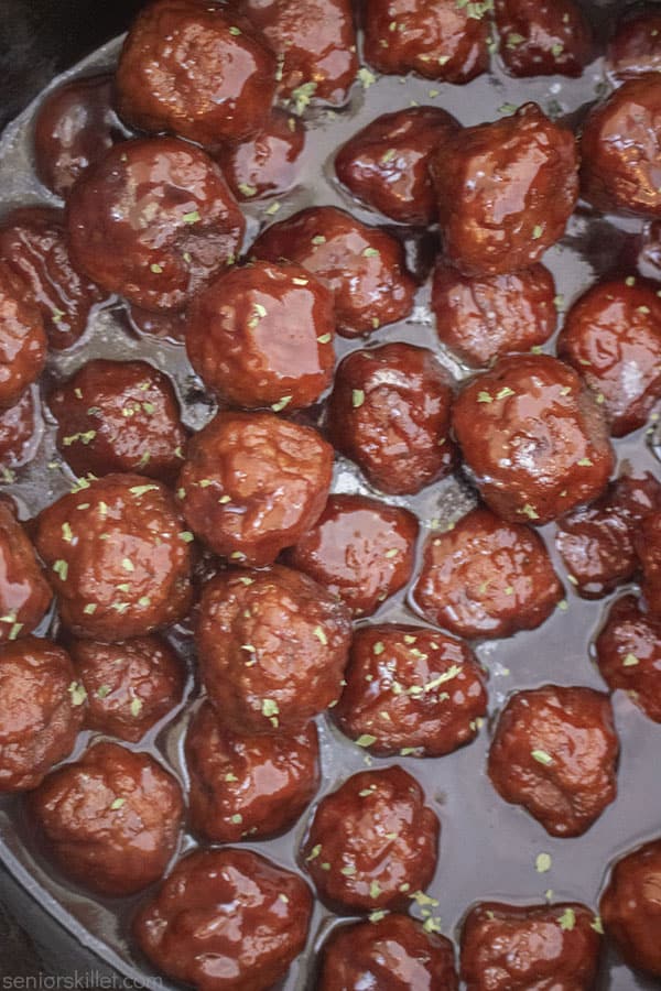 JElly and BBQ meatballs in a Dutch oven
